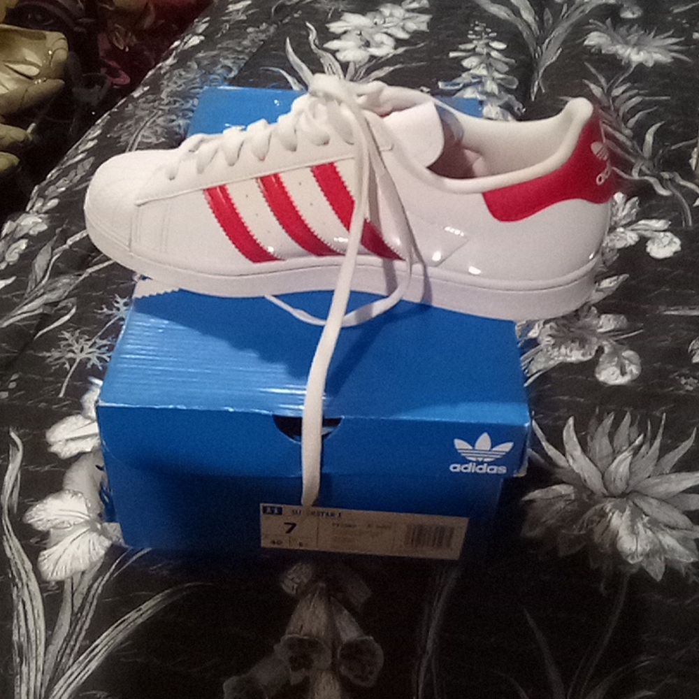 Adidas shoes never worn, all sales are final no refund